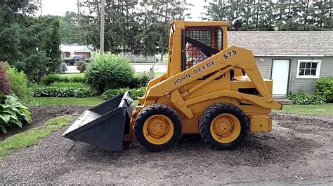 john deere 575 skid steer specs|john deere 575 specs.